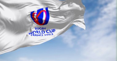 Paris, FR, 8 Eylül 2023: Rugby Dünya Kupası 2023 bayrağı açık bir günde sallanıyor. Etkinlik 8 Eylül - 28 Ekim 2023 tarihleri arasında Fransa 'da gerçekleşecek. Resimli 3d illüstrasyon oluşturucu