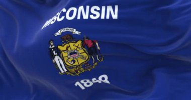 Wisconsin eyaletinin rüzgarda dalgalanan bayrağının yakın çekimi. Merkezi armalı mavi bayrak. Kusursuz 3 boyutlu animasyon. Yavaş çekim döngüsü. Seçici odaklanma. 4k
