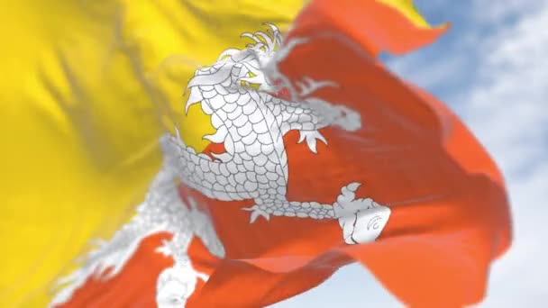 Close Van Nationale Vlag Van Bhutan Wapperend Gele Bovenste Driehoek — Stockvideo