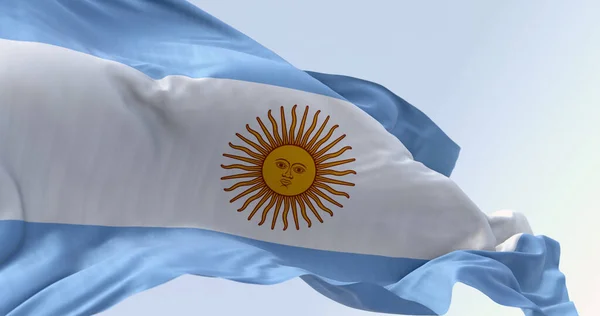 Close-up of Argentina national flag waving on a clear day. Three equal blue and white horizontal bands with the Sun of May in the center. 3d illustration render. Close-up. Pride and patriotism