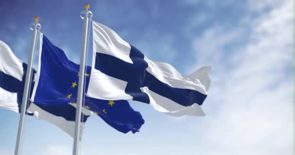 Bandeiras Nacionais Finlândia Agitando Vento Com Bandeira União Europeia Dia — Vídeo de Stock