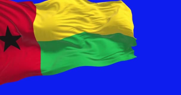 Bandera Nacional Guinea Bissau Ondeando Aislada Sobre Fondo Azul Animación — Vídeos de Stock