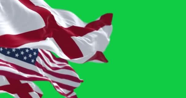 アラバマ州とアメリカの国旗が緑の背景を振っている 白いフィールドに赤い十字架 シームレス3Dレンダリングアニメーション グリーン スクリーン クロマキー スローモーションループ 4Kについて 選択的なフォーカス — ストック動画