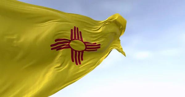 Close-up of New Mexico state flag waving in the wind. Symbol of Zia red sun in a yellow field. 3d illustration render. Rippling fabric