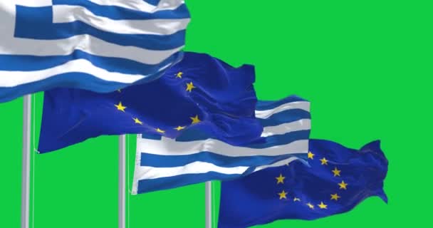ギリシャと欧州連合の旗が緑色の背景を振っている 1981年 欧州連合加盟 シームレス3Dレンダリングアニメーション クロマキー スローモーションループ 4Kについて 選択的なフォーカス — ストック動画