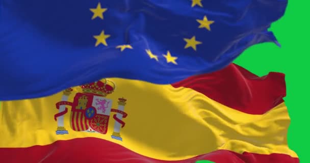 スペインの国旗と欧州連合の旗は緑の背景で孤立した 国際協力 シームレス3Dレンダリングアニメーション クロマキー スローモーションループ 4Kについて 選択的なフォーカス — ストック動画