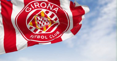 Barcelona, SP, Dec 1 2023: Close-up of Girona football club flag waving . FC Girona is a Spanish professional football club based in Barcelona. Illustrative editorial 3d illustration render