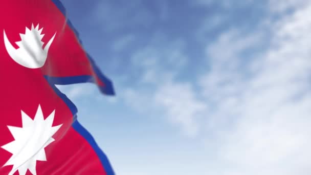 ネパールの国旗の閉鎖は晴れた日に風を振る 世界で唯一の非四国旗 シームレス3Dレンダリングアニメーション スローモーションループ 選択的なフォーカス — ストック動画