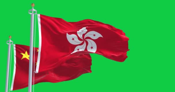 香港と中国の旗が緑色の画面で風を振っている 香港は中国の都市であり 特別行政区である シームレス3Dレンダリングアニメーション クロマキー スローモーションループ 4Kについて — ストック動画
