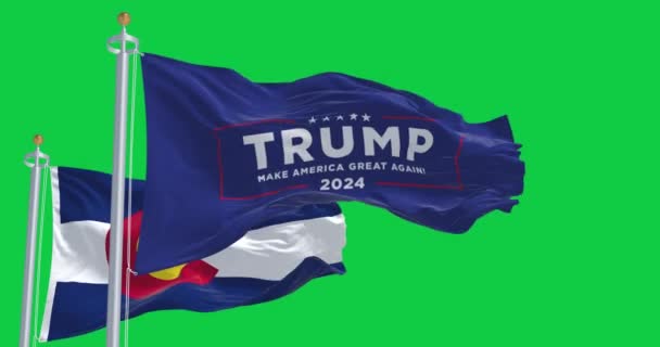 Dec 2023 화면에 콜로라도 국기와 흔들리는 트럼프 2024 캠페인 플래그 — 비디오
