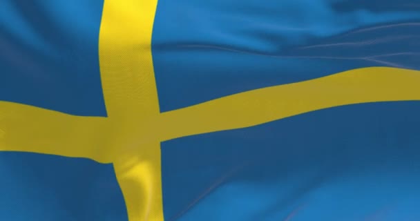 Närbild Sveriges Flagga Viftar Gult Nordiskt Kors Blå Bakgrund Skandinaviskt — Stockvideo