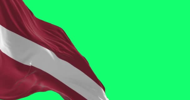 拉脱维亚共和国的国旗在绿色背景下飘扬 无缝3D渲染动画 慢动作回圈绿色屏幕 有选择的重点 — 图库视频影像