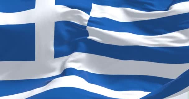 希腊国旗在风中飘扬的特写 蓝白相间的条纹 蓝色的州带着白色的十字 无缝3D渲染动画 慢动作回圈有选择的重点 — 图库视频影像