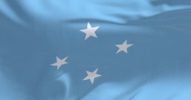 Mikronezya Birleşik Devletleri 'nin ulusal bayrağı açık bir günde rüzgarda sallanıyor. Pasifik Okyanusu 'nda bağımsız bir eyalet. Kusursuz 3 boyutlu animasyon. Yavaş çekim döngüsü