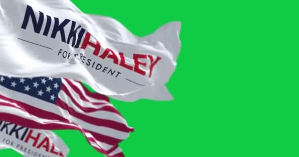 查尔斯顿 2023年11月15日 Nikki Haley和美国国旗在绿色背景下飘扬 无缝3D渲染动画 慢动作回圈绿色屏幕 有选择的重点 — 图库视频影像