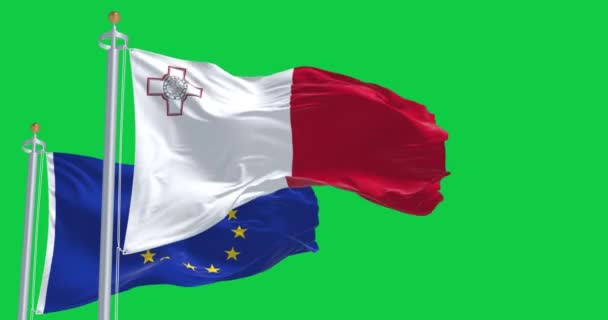 Flaggor Malta Och Europeiska Unionen Vinkar Vinden Isolerad Grön Bakgrund — Stockvideo