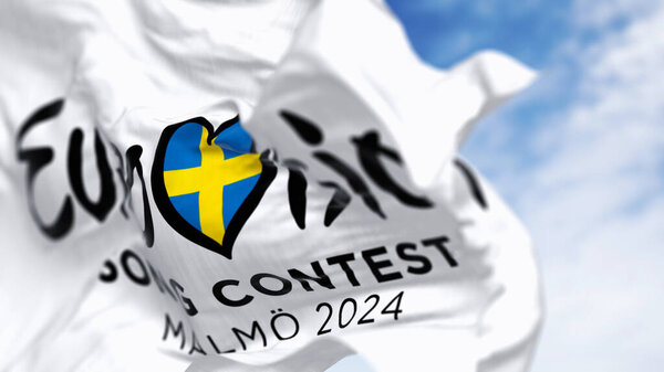 Мальме, Швеция, март. 18 2024: Крупный план конкурса песни "Евровидение-2024" размахивает в ясный день. Чемпионат 2024 года пройдет в Мальме в мае. Иллюстративная редакционная 3D иллюстрация