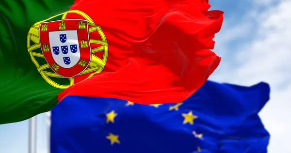 Close-up of Portugal and the European Union flags waving on a clear day. Democracy and politics. Rippled textile, 3d illustration render. Selective focus
