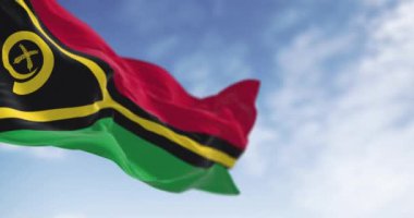 Vanuatu 'nun ulusal bayrağı açık havada rüzgarda sallanıyor. Vanuatu, Güney Pasifik Okyanusu 'nda bulunan bir ada ülkesidir. Kusursuz 3 boyutlu animasyon. Yavaş çekim döngüsü. Seçici odak