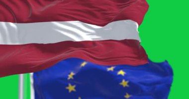 Letonya ve Avrupa Birliği bayrakları dalgalanıyor. Letonya, Avrupa Birliği ve Avro Bölgesi üyesidir. Kusursuz 3D canlandırma animasyonu. Krom anahtar. Yavaş çekim döngüsü. Yeşil ekran. 4 bin. Seçici odak.