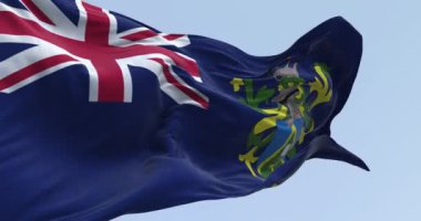 Pitcairn adalarına yakın çekim rüzgarda dalgalanan bayrak. Güney Pasifik 'teki İngiliz Denizaşırı Bölgesi. Kusursuz 3 boyutlu animasyon. Yavaş çekim döngüsü. Seçici odak