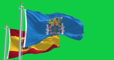 Melilla ve ulusal İspanyol bayrağı yeşil arka planda izole edilmiş olarak dalgalanıyor. Kusursuz 3D canlandırma animasyonu. Krom anahtar. Yavaş çekim döngüsü. Yeşil ekran. 4 bin. Seçici odak