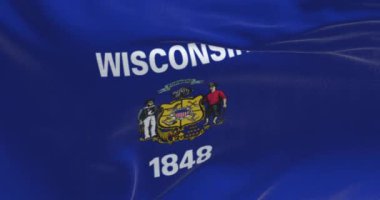 Wisconsin eyaletinin rüzgarda dalgalanan bayrağının yakın çekimi. Merkezi armalı mavi bayrak. Kusursuz 3 boyutlu animasyon. Yavaş çekim döngüsü. Seçici odak