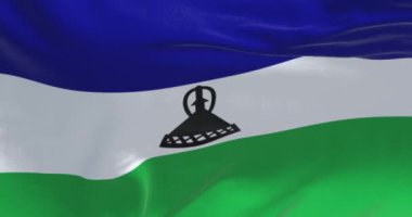 Ulusal Lesotho bayrağının yakın çekimi. Kusursuz 3 boyutlu animasyon. Yavaş çekim döngüsü. Seçici odak
