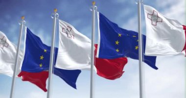 Malta ve Avrupa Birliği bayrakları açık bir günde rüzgarda sallanıyor. Malta Mayıs 2004 'te AB üyesi oldu. Kusursuz 3 boyutlu animasyon. Yavaş çekim döngüsü. Seçici odak