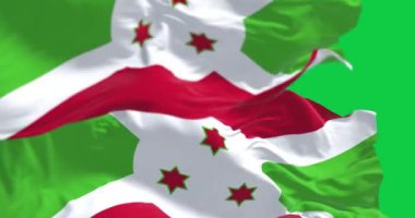 Burundi 'nin milli bayrağı yeşil arka planda izole edilmiş. Kusursuz 3D canlandırma animasyonu. Krom anahtar. Yavaş çekim döngüsü. Yeşil ekran. 4 bin. Seçici odak