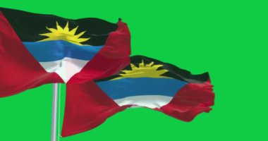 Yeşil arka planda iki Antigua ve Barbuda ulusal bayrağı sallanıyor. Kusursuz 3D canlandırma animasyonu. Krom anahtar. Yavaş çekim döngüsü. Yeşil ekran. 4 bin. Seçici odak