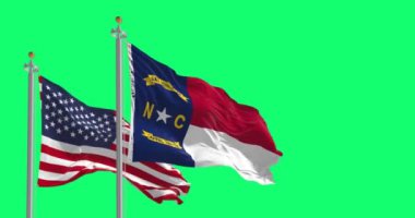 Kuzey Carolina eyaletinin bayrakları yeşil arka planda izole edilmiş Amerikan bayrağıyla dalgalanıyor. Kusursuz 3D canlandırma animasyonu. Krom anahtar. Yavaş çekim döngüsü. Yeşil ekran. 4 bin. Seçici odak