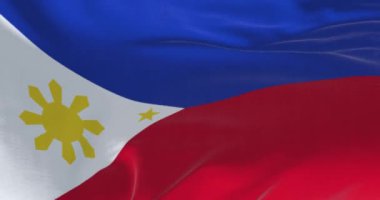 Filipinler 'in ulusal bayrağının rüzgarda dalgalandığı yakın plan çekimleri. Kusursuz 3 boyutlu animasyon. Yavaş çekim döngüsü. Seçici odak.