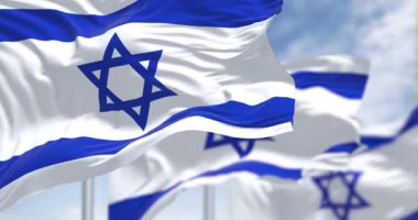 İsrail devleti ulusal bayrakları açık bir günde dalgalanıyor. Mavi Davut Yıldızı ortada, iki yatay mavi çizgi beyaz bir sahada. Kusursuz 3 boyutlu animasyon. Yavaş çekim döngüsü. Seçici odak