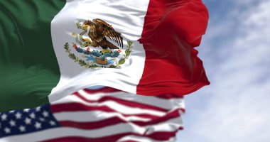 Meksika ve ABD bayrakları açık bir günde dalgalanıyor. Üç renkli yeşil, beyaz ve kırmızı. Beyaz çizginin ortasında milli arma var. 3 boyutlu illüstrasyon. Dalgalı tekstil. Seçici odak
