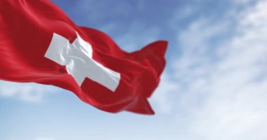 Kızıl kare sahasında koyu beyaz haçlı İsviçre bayrağı sallanıyor. Tarafsızlığın, birliğin ve Alp gururunun asırlık sembolü. Kusursuz 3 boyutlu animasyon. Yavaş çekim döngüsü. Seçici odak