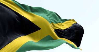 Rüzgarda dalgalanan Jamaika bayrağının yüksek çözünürlüklü 3D görüntüsü. İkonik sarı hiciv ulusal gurur, özgürlük ve Karayip kimliğini temsil ediyor. Yazı işleri ve turizm kullanımı için mükemmel