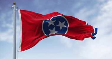 Tennessee eyalet bayrağının yakın çekimi. Merkezinde üç beyaz yıldız bulunan mavi daireli kırmızı alan. Amerikan bayrağı. Kusursuz 3 boyutlu animasyon. Yavaş çekim döngüsü. Seçici odak