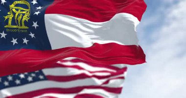 Gürcistan ve ABD bayrakları açık bir günde rüzgarda sallanıyor. Georgia, ABD 'nin güneydoğusunda bir eyalettir. Birleşik Devletler Federal Eyaleti. Kusursuz 3 boyutlu animasyon. Yavaş çekim döngüsü. Seçici odak