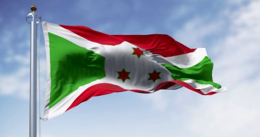 Burundi 'nin ulusal bayrağı açık havada dalgalanıyor. Kırmızı ve yeşil bölümlere bölünen beyaz köşegen, ortada üç yeşil yıldız. 3D illüstrasyon canlandırıcı. Kanat çırpan kumaş. Seçici odak