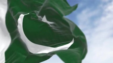 Beyaz yıldız ve hilal içeren Pakistan bayrağı ilerleme ve ışığı simgeliyor. Kusursuz 3 boyutlu animasyon. Yavaş çekim döngüsü. Seçici odak