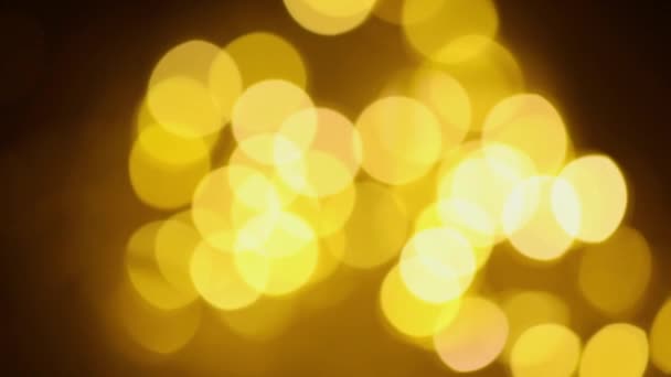 圣诞节黑暗的背景 金色的离焦光 — 图库视频影像