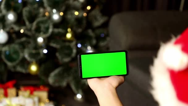 Різдвяному Фоні Руці Телефон Зеленим Екраном — стокове відео