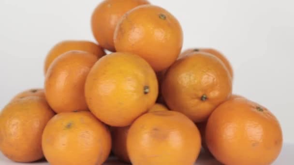 Ripe Tangerines Spin Light Background — 비디오