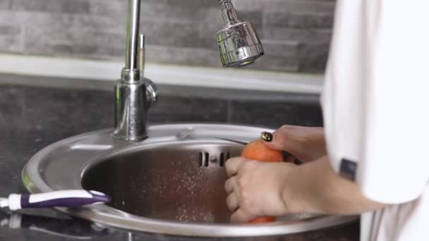 Female Hands Peeling Peel Carrot Close — Video Stock