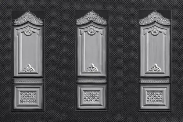 Kahverengi bir metal kapının arkaplanı.