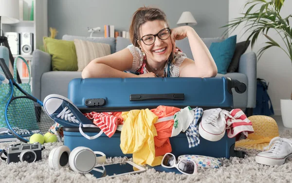 Happy Young Woman Packing Trip She Leaning Her Full Trolley — Stock Photo, Image