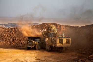 Madencilik kazıcısı, özellikle madencilik operasyonlarında kazma ve yükleme malzemeleri için tasarlanmış ağır, büyük bir inşaat makinesidir..