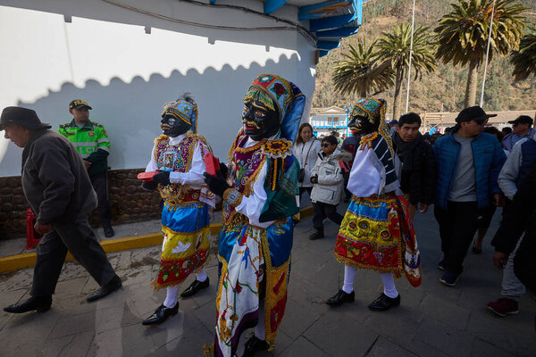 the Negrillos of Paucartambo dance with grace, color, and rhythm, honoring centuries of devotion during the vibrant Virgen del Carmen festival
