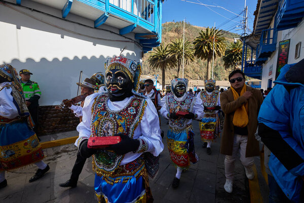 the Negrillos of Paucartambo dance with grace, color, and rhythm, honoring centuries of devotion during the vibrant Virgen del Carmen festival